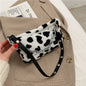 Bolso Animal Print de Peluche con Cadena – Estilo Salvaje y Único ✨